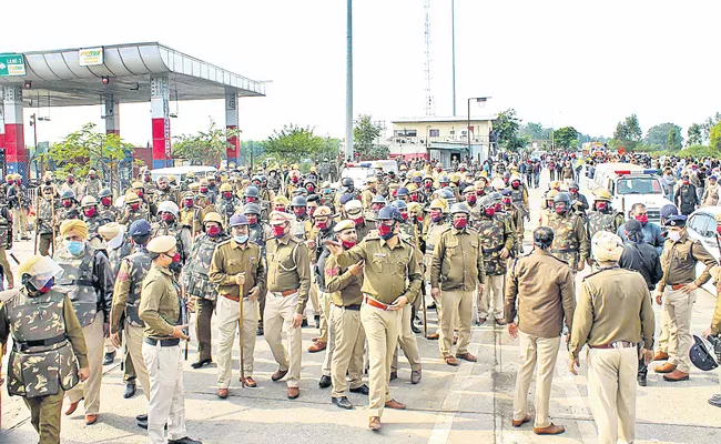 Farmers brave water cannons and tear gas as they inch towards Delhi - Sakshi