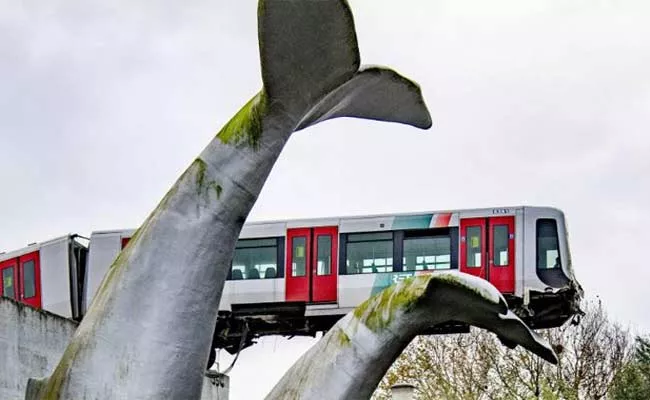 Subway Train Crashed and Lands on Whale Sculpture Tail in Netherland - Sakshi