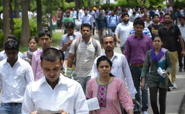 India's Unemployment Rate Rises To 6.98%:CMIE  - Sakshi