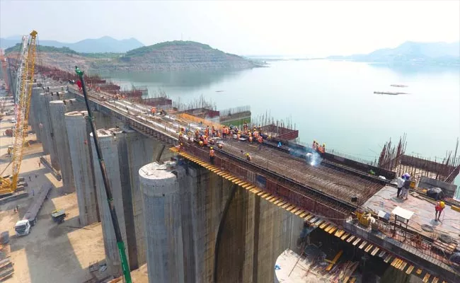 Polavaram Project Works Continue To Complete in Time - Sakshi