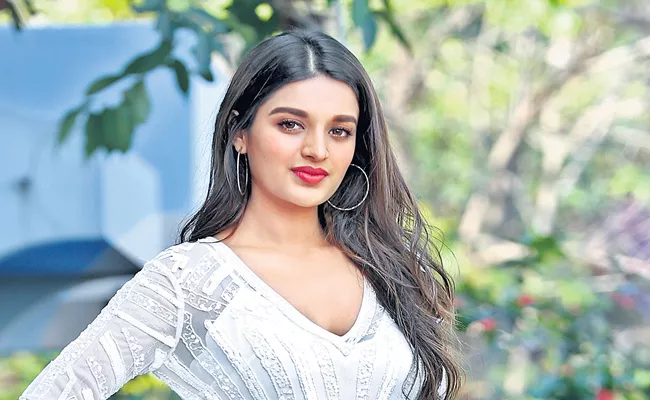 Nidhhi Agerwal to shoot for Udhayanidhi Stalin film from next - Sakshi