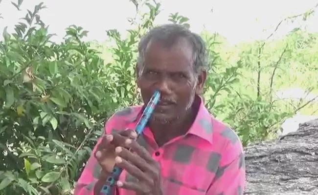 Mahabubnagar Man Plays Flute With Nose - Sakshi