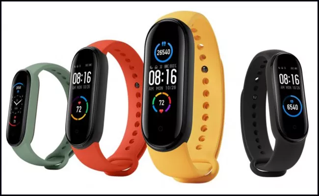 Mi fitness band 5 with 2 new features - Sakshi