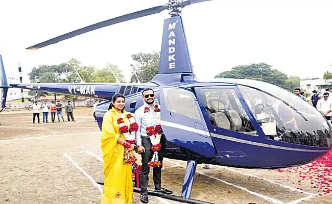 Brother Took His Sister In Helicopter At Mumbai - Sakshi