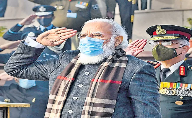 PM Narendra Modi pays tribute at National War Memorial on Vijay Diwas - Sakshi