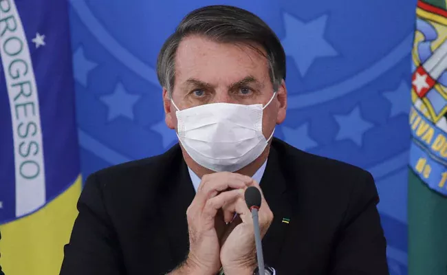 Covid vaccine can turn people into crocodiles Bolsonaro - Sakshi