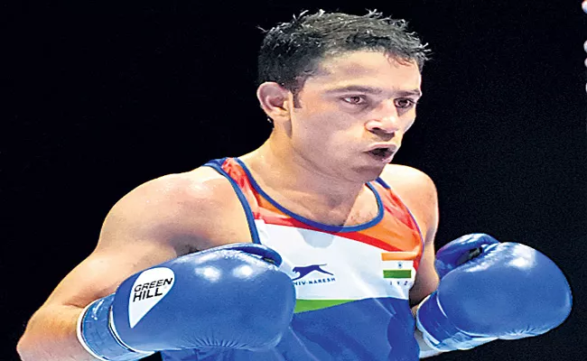 Panghal clinches gold, injured Satish bags silver at Cologne World Cup - Sakshi