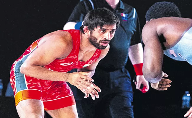 Indian star wrestler Bajrang Poonia ended this year with a gold medal - Sakshi