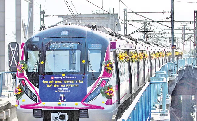 PM Narendra Modi inaugurates India first driverless train - Sakshi