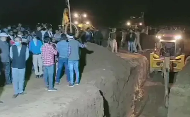 Four yearold boy falls into open borewell in UP - Sakshi