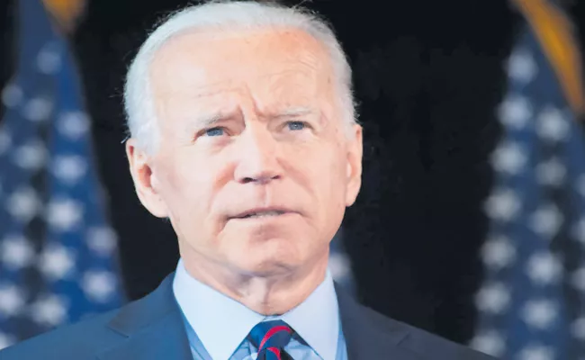 Joe Biden to Ask Americans to Wear Masks for 100 Days - Sakshi