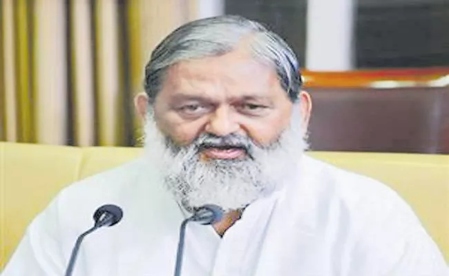 Haryana minister Anil vij tests positive after 1st Covaxin shot - Sakshi