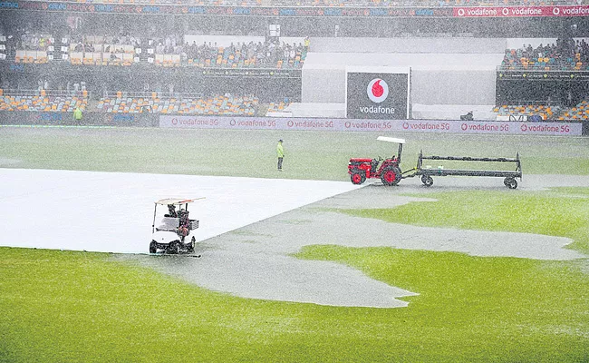 Australia 369 Allout India score 62 for 2 before rain plays spoilsport - Sakshi