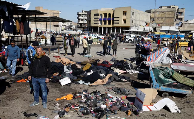 Twin suicide bombings kill at least 32 in Baghdad - Sakshi