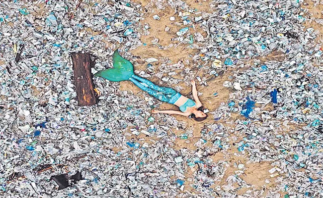 Mermaid Message On Garbage In Sea Coast In Indonesia - Sakshi