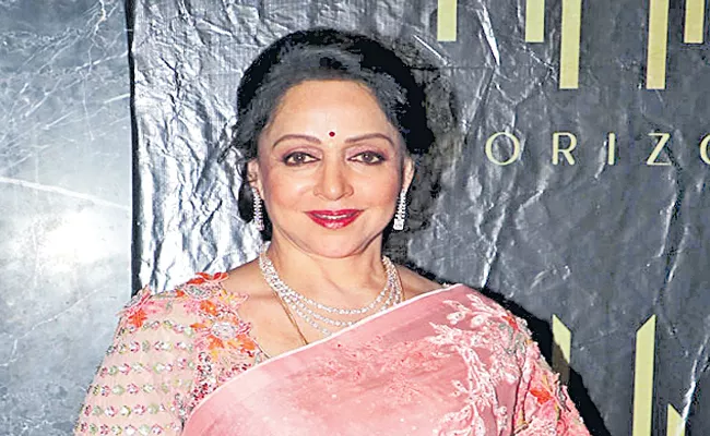 Hema Malini Playing Key role in Prabhas movie - Sakshi