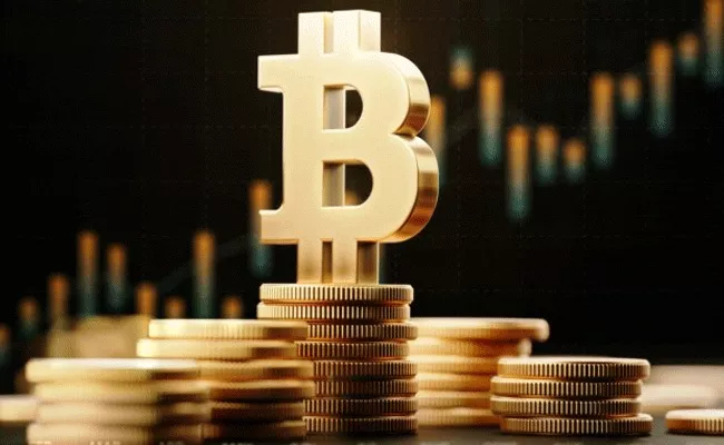 Bitcoin: Canadian Regulator Clears Launch of World's First Bitcoin ETF - Sakshi