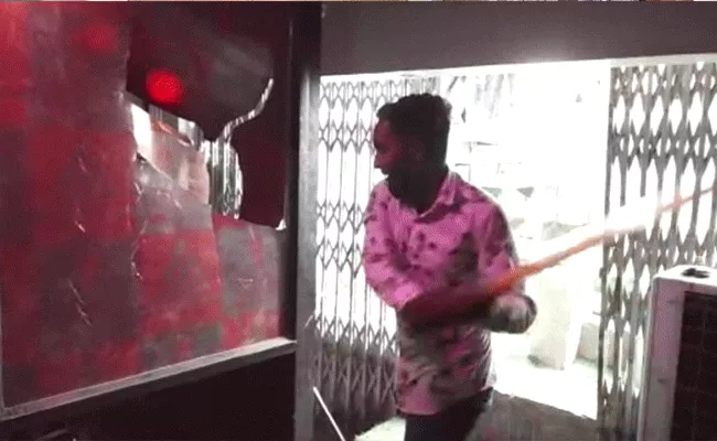 Shiv Sena Activists Vandalizing Restaurant On Valentines Day - Sakshi