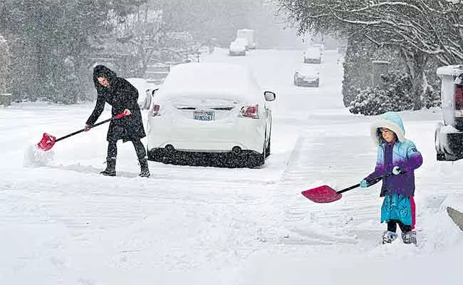 Polar Plunge: Winter Storm Grips Much Of US - Sakshi