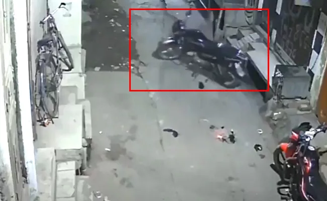 Viral Video: Parked Bike Moves On Its Own Recorded In CCTV - Sakshi