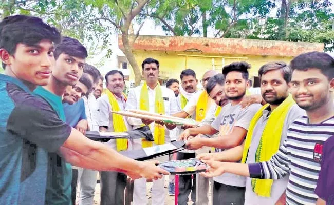 TDP Leaders Distribute Cricket Kits To Youth Voters In Vizianagaram - Sakshi