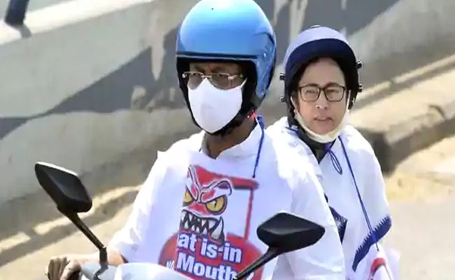 Mamata Banerjee Rides Electric Scooter to Protest Against Rising Fuel prices - Sakshi