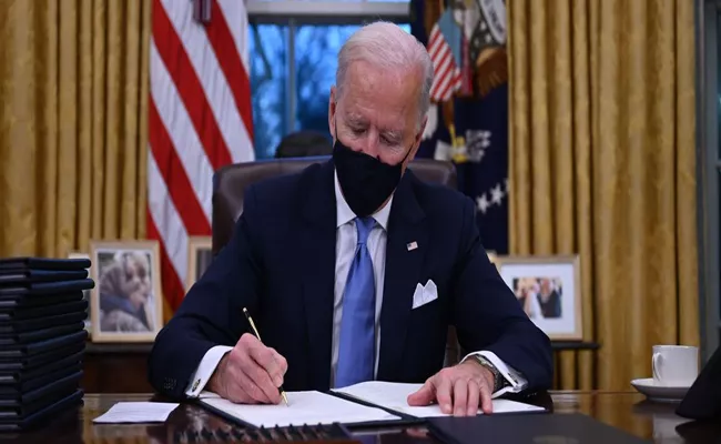 Joe Biden Revokes Trump Ban On Many Green Card Applicants - Sakshi