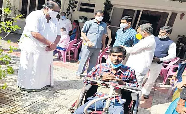 TS Speaker Pocharam Srinivas Reddy Helps Handicapped Person - Sakshi