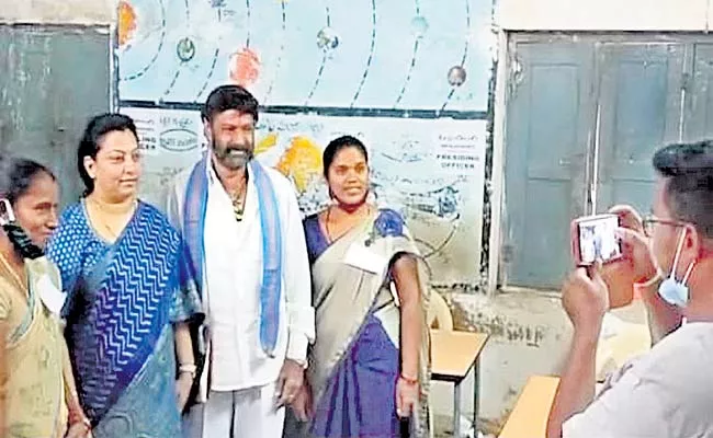 Balakrishna Poses With Election Staff At Polling Station - Sakshi