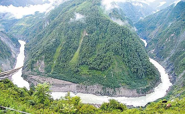 China will build a major hydropower project on Brahmaputra river - Sakshi