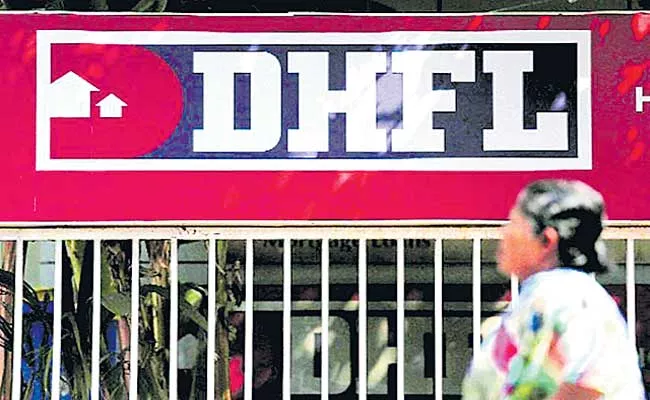 DHFL booked for creating 2.60 lakh fake home loan accounts under PMAY - Sakshi