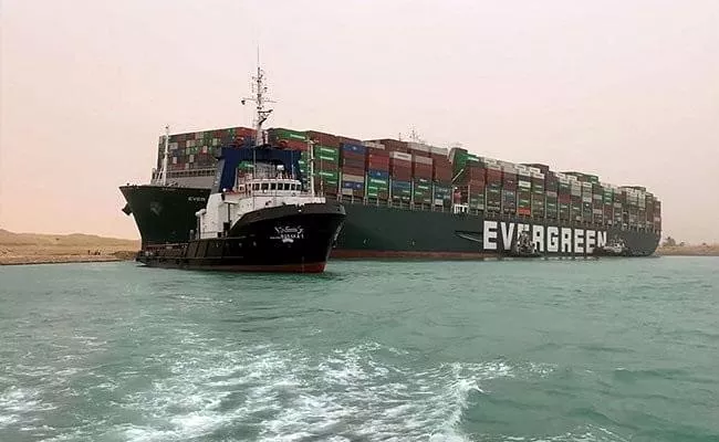 Massive Ship Blocking Suez Canal Costs About 400 Million Dollars An Hour - Sakshi