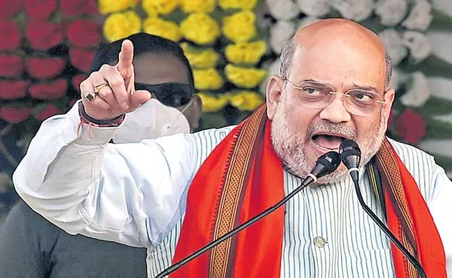 Vote BJP for schemes TMC for scams Says Amit Shah - Sakshi