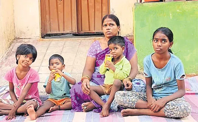 Man Protest With Family Infront OF House In Chilakaguda - Sakshi