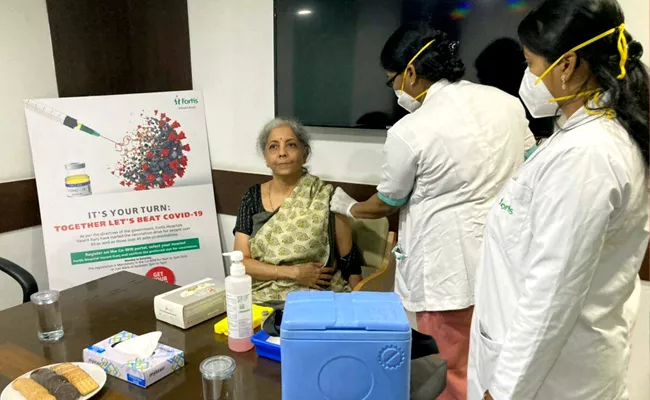 Fortunate to be in India says Nirmala Sitharaman after getting vaccinated - Sakshi