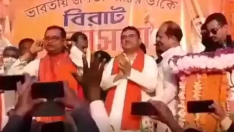 TMC leader Performs Sit Ups on Stage as He Joins BJP - Sakshi