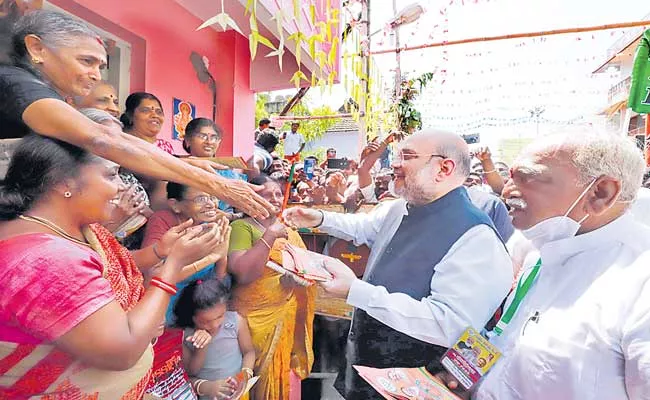 Amit Shah road show in Nagercoil in Tamil Nadu - Sakshi