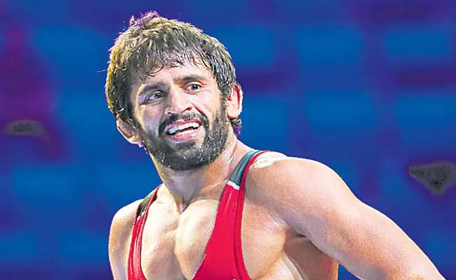 Bajrang Punia wins gold at Rome Ranking Series wrestling - Sakshi