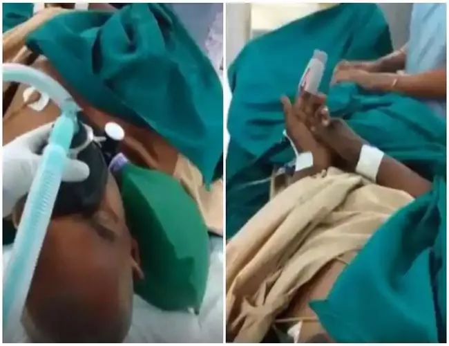 Viral Video: Man On A Ventilator With Oxygen Mask On Makes Khaini - Sakshi