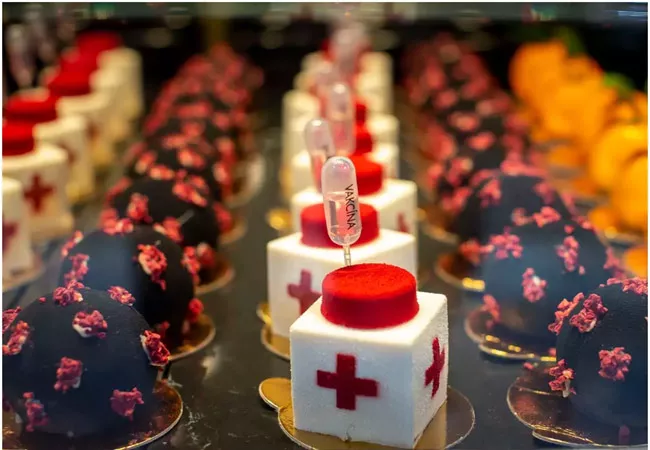 Hungarian Pastry Shop Makes Coronavirus Vaccine Themed Desserts  - Sakshi