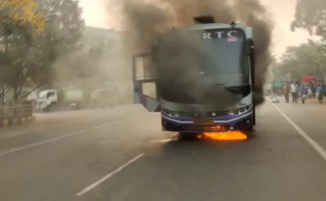 Fire Breaks Out In RTC Bus At Kakinada - Sakshi