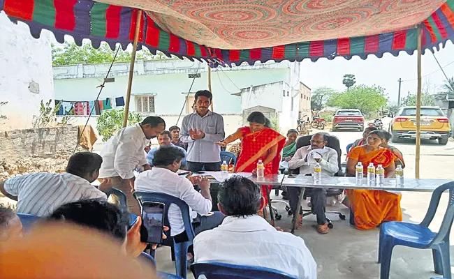 TDP sarpanch swearing in in front of the house - Sakshi