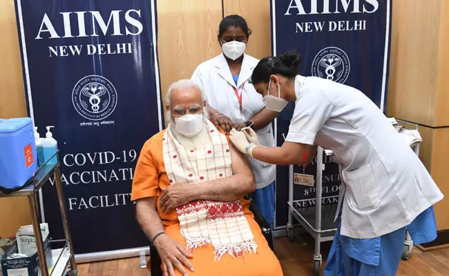 PM Narendra Modi Takes 2nd Dose Of Covid Vaccine At AIIMS - Sakshi