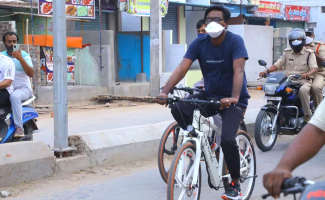 Minister Puvvada Ajay Kumar Cycle Visit In Khammam District - Sakshi