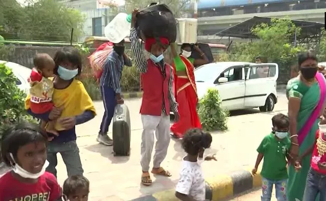 Re Return: Migrant Workers Leaving From Mumbai, Delhi - Sakshi