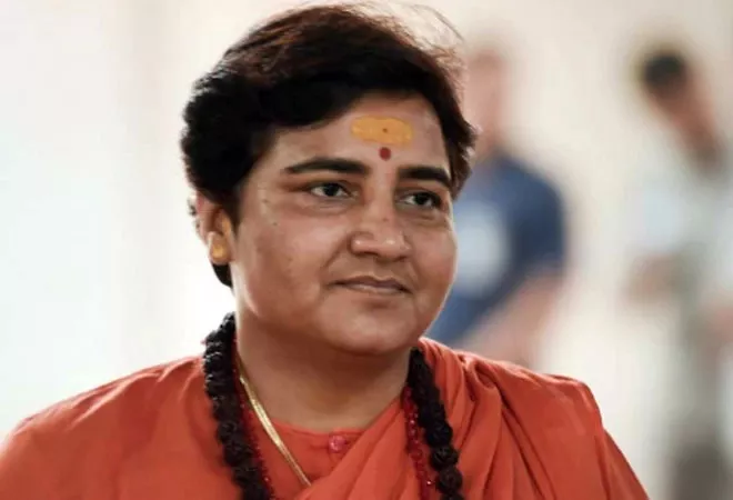 BJP MP Pragya Thakur Says I Drink Cow Urine Every Day So Did Not Get Corona - Sakshi