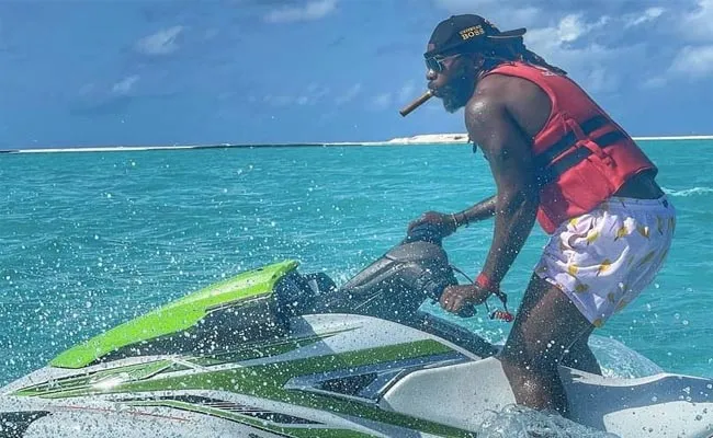 Chris Gayle Shows Off Jet Skiing Skills In Maldives - Sakshi