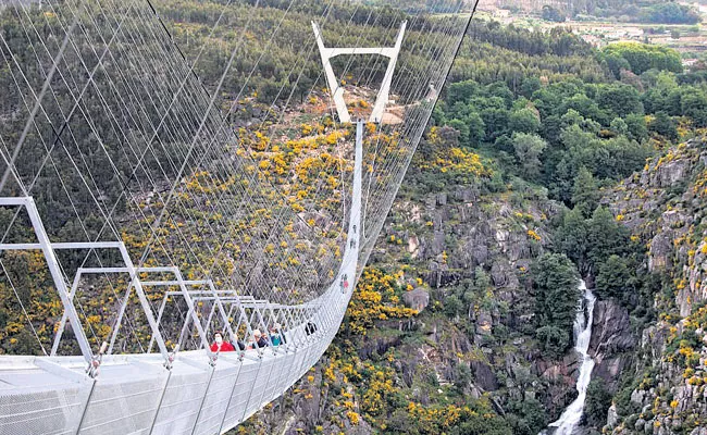 World Longest Pedestrian Suspension Bridge Opens In Portugal, Details Here - Sakshi