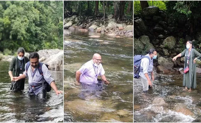 Kerala Doctors Cross River Trek Hhills To Reach Tribal Village - Sakshi