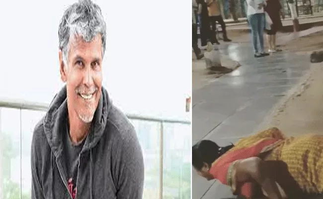 Milind Soman Asks Woman To Do Push Ups For Selfie - Sakshi